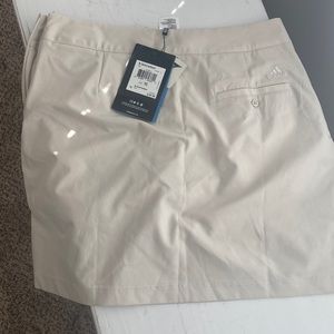 Adidas tennis skirt never worn brand new has pockets